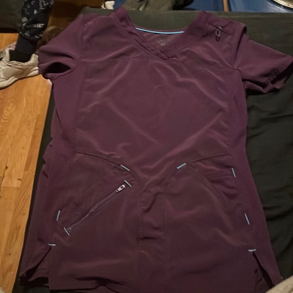 Purple woman’s scrub top $15